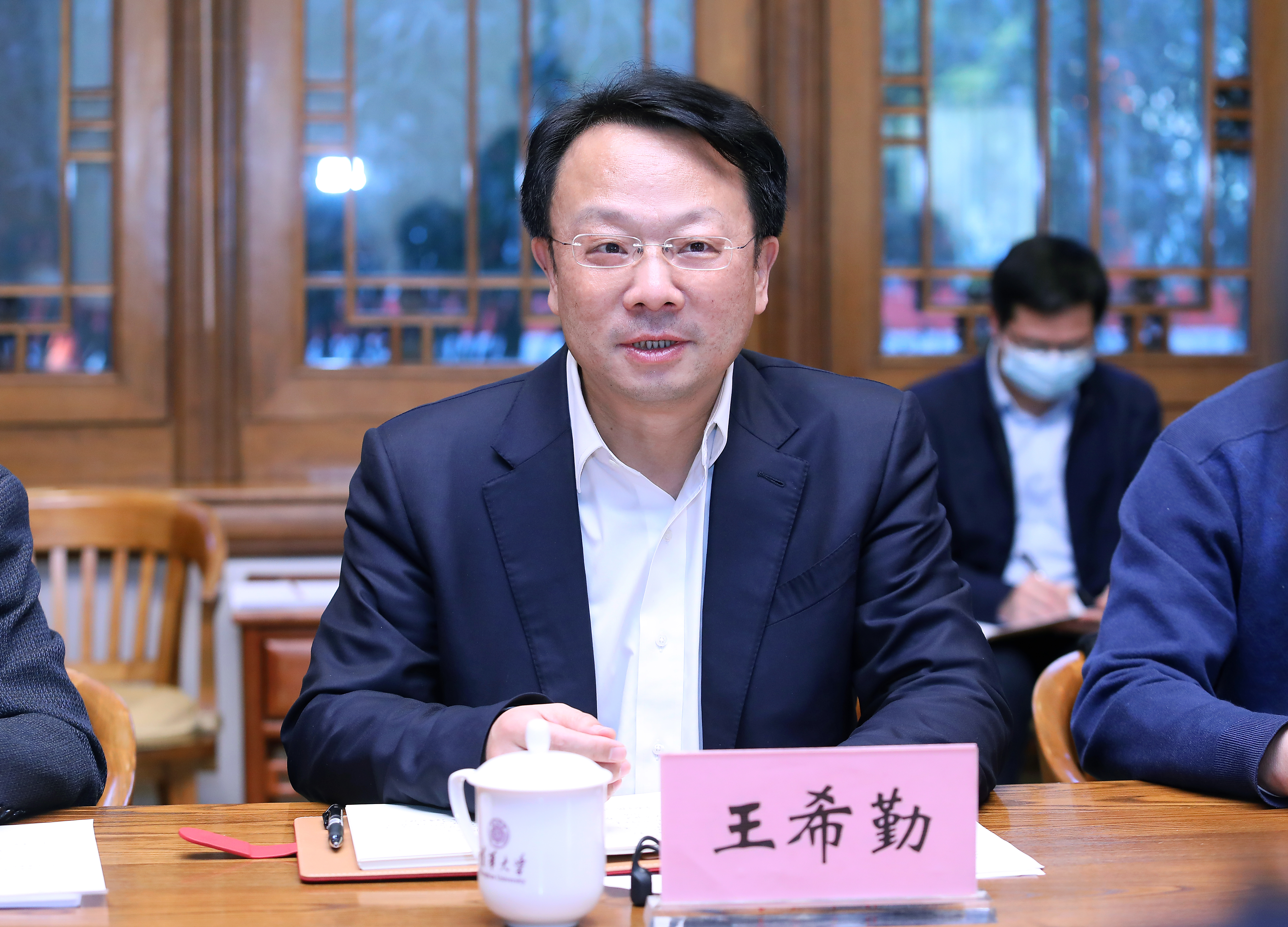 20220301-金沙集团3354cc与中医药管理局签署合作框架协议-许刚-王希勤定版.jpg